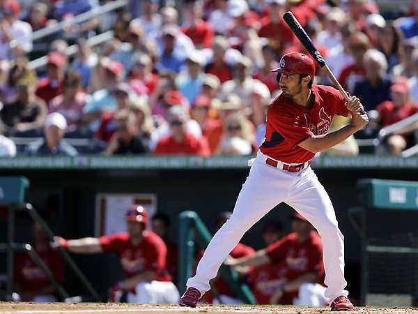 Matt Carpenter can get comfortable in red after signing a contract extension with the Redbirds. (Jeff Roberson/AP)